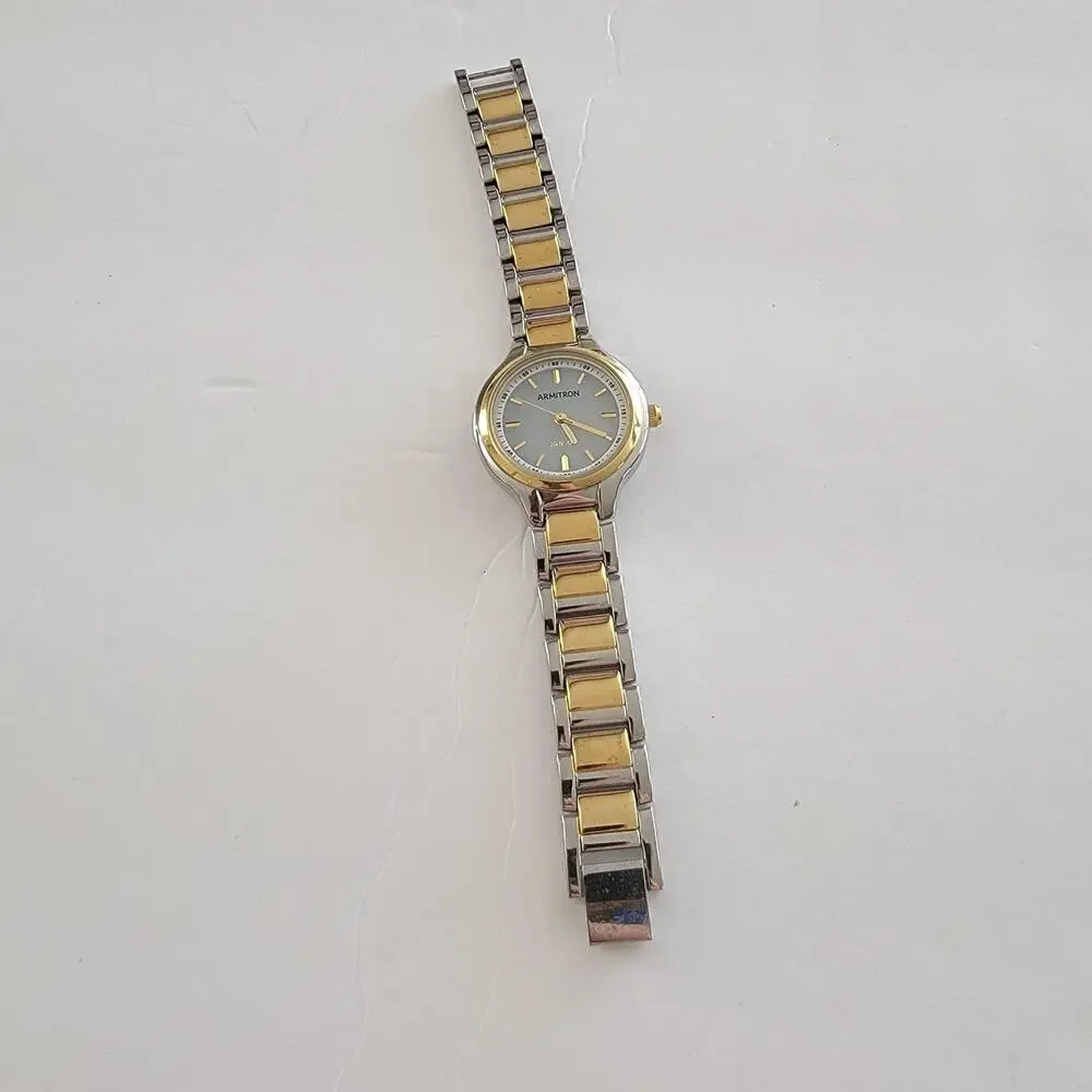 Armitron Womens Watch Gray Dial Silver Case Gold Bracelet Solar Quartz